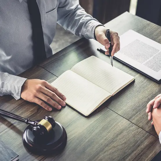 two people sitting at a desk