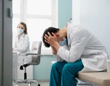 a man sitting in a doctor's office