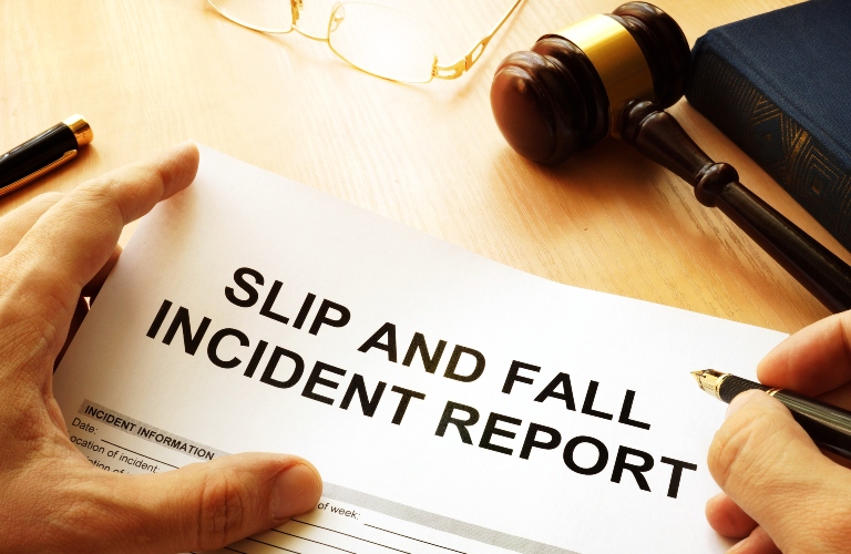 Slip and fall injury report on a table