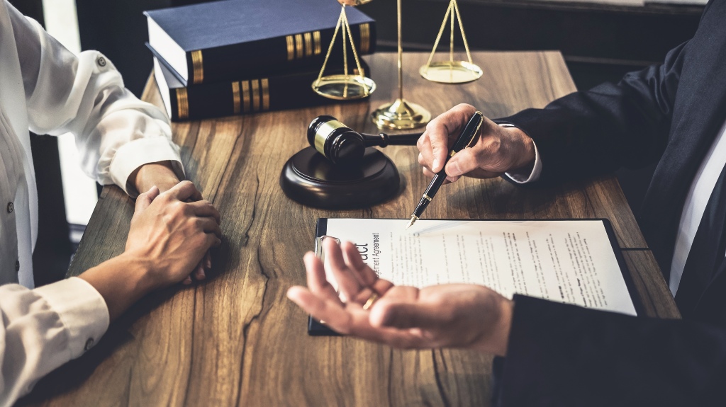 lawyer consults clients