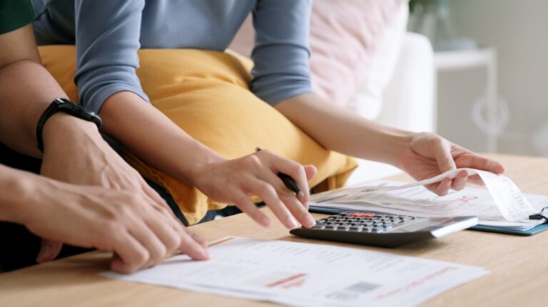 woman calculating medical bills