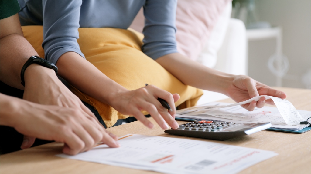 woman calculating medical bills