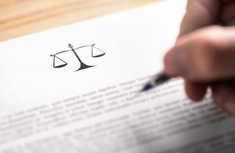 person is reading legal document