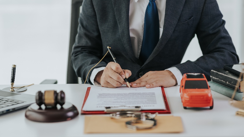 Judge male hand with car and documents