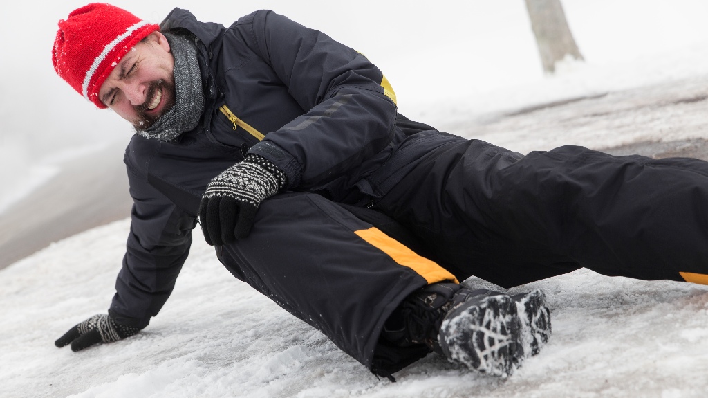 The man slipped and fell on the ice