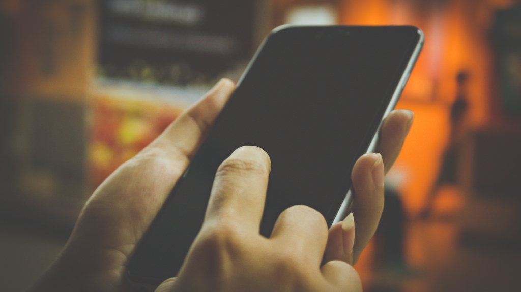 Man is using smartphone